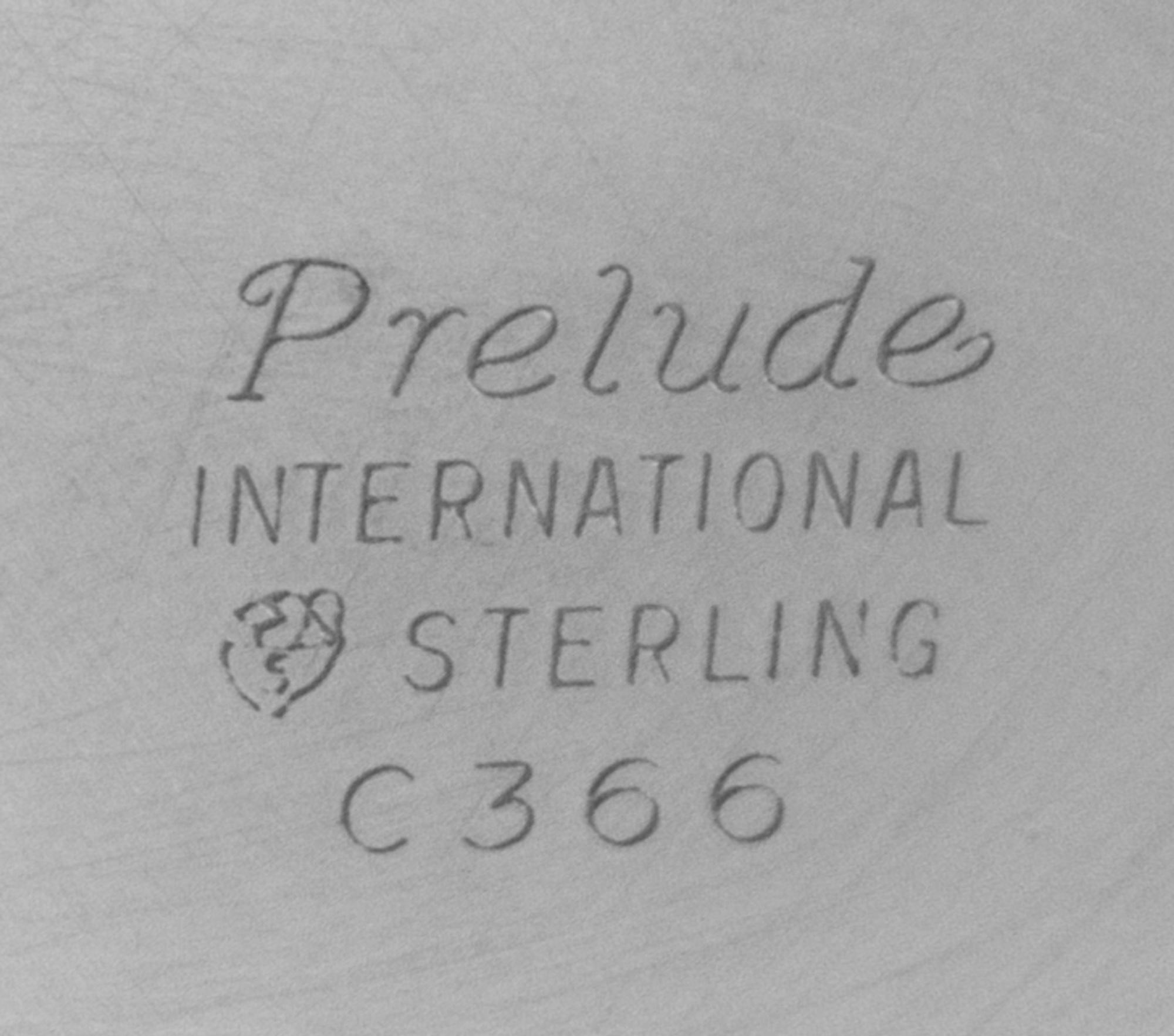 An American Silver Five-Piece Tea and Coffee Service, International Silver Co., Meriden, CT, Prelude pattern, comprising a teapot, coff
