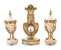 A French Gilt Bronze Mounted Onyx Clock Garniture