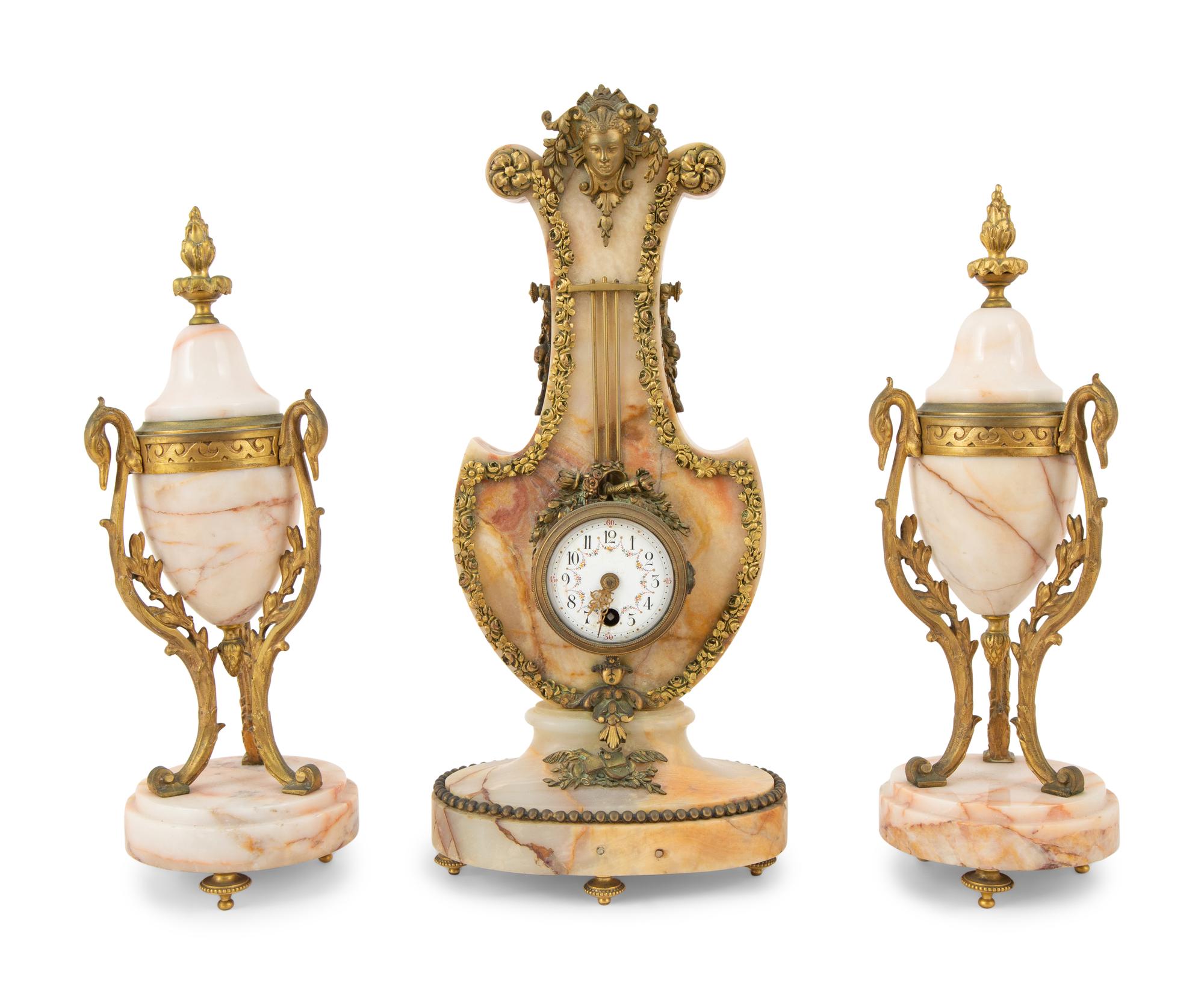 A French Gilt Bronze Mounted Onyx Clock Garniture