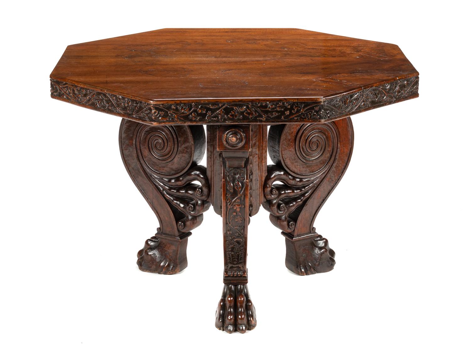 An Italian Baroque Carved Walnut Center Table