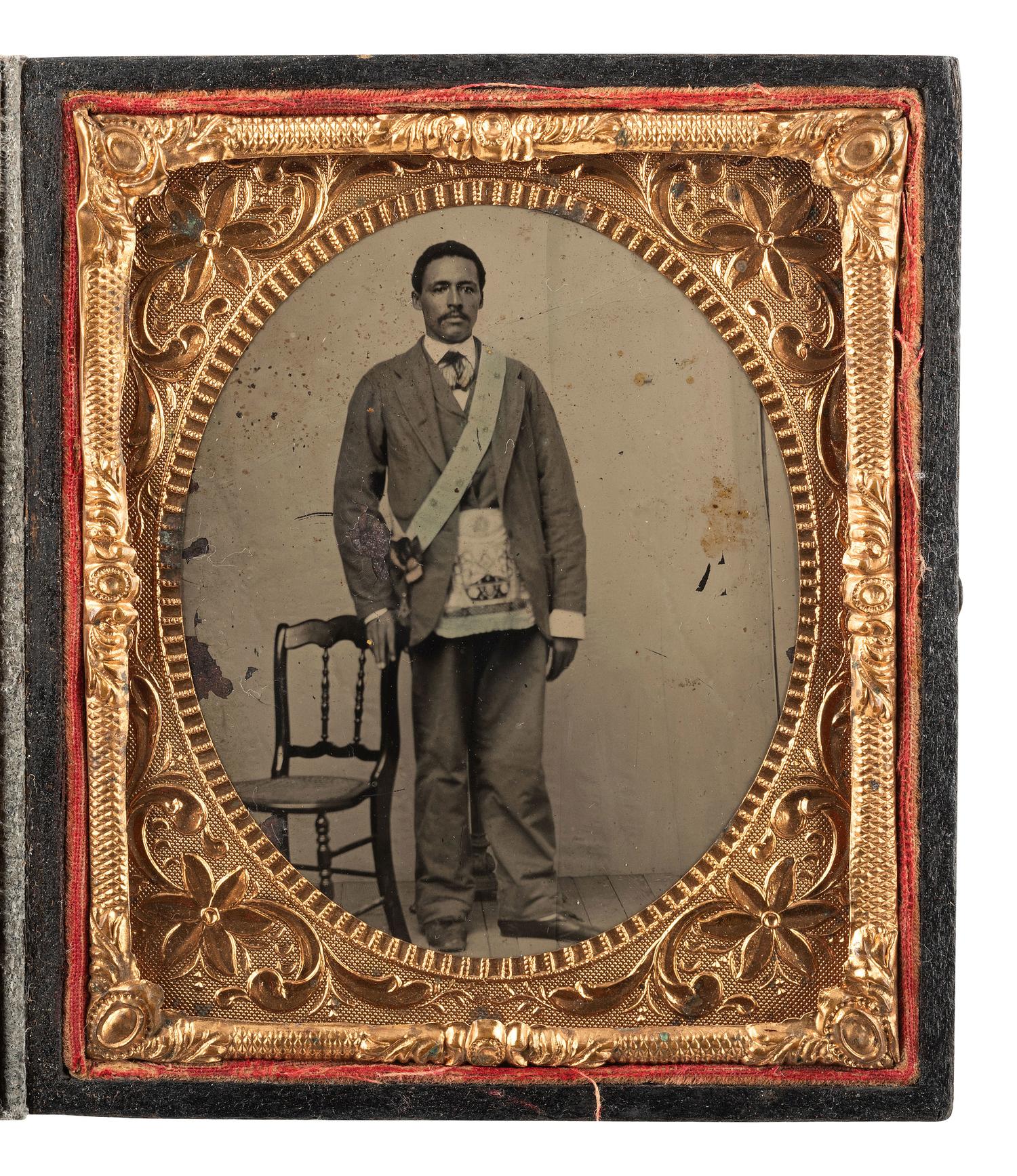[EARLY PHOTOGRAPHY]. Sixth plate tintype portrait of an African American man wearing Masonic attire.