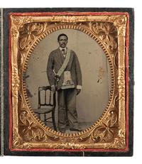 [EARLY PHOTOGRAPHY]. Sixth plate tintype portrait of an African American man wearing Masonic attire.