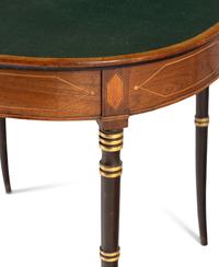 A Regency Parcel Gilt Mahogany Game Table
