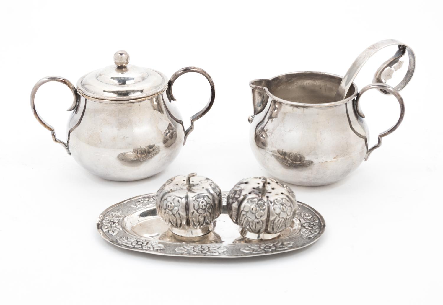A Group of Mexican Silver Table Articles, , comprising a creamer and sugar, two spoons, two castors in the shape of gourds and a small