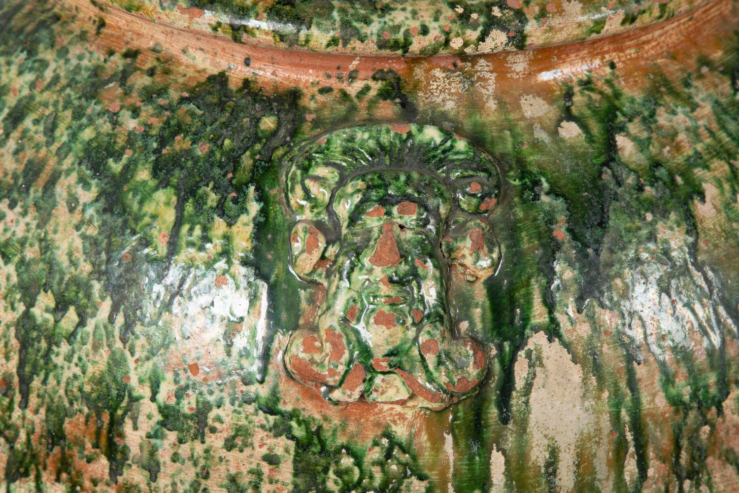 An Italian Green Glazed Terra Cotta Large Oil Jar