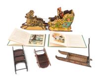 A Bliss Lithograph on Wood Santa on Sleigh and a Santa Claus on a Tin Sleigh