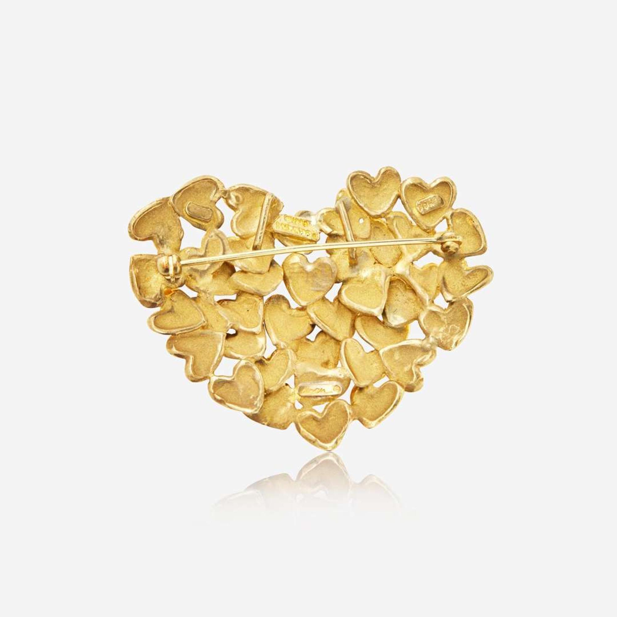 An 18K Yellow Gold Pin by Movado