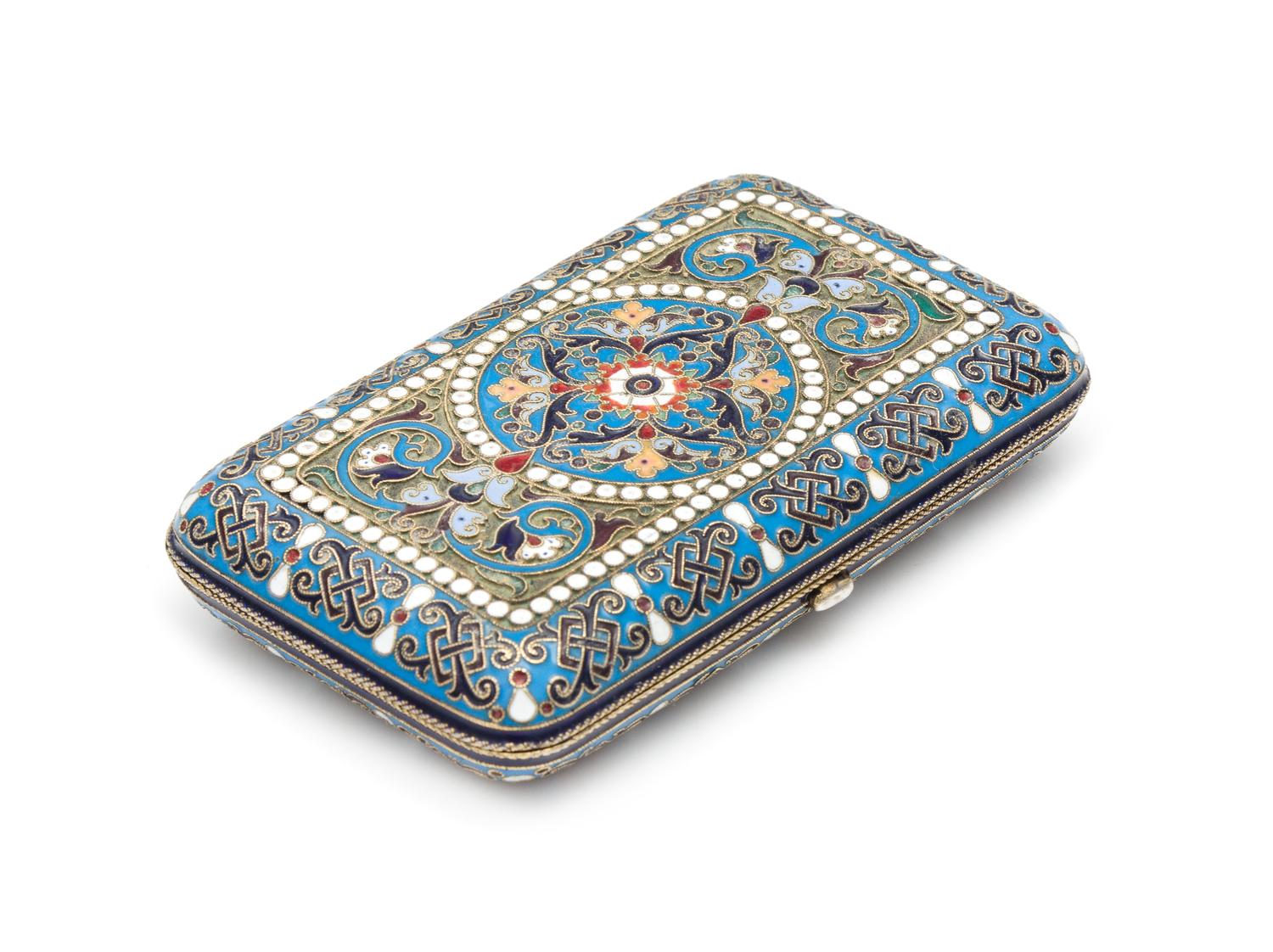 A Russian Enameled Silver Cigarette Case, Mark of Pavel Ovchinnikov with an Imperial Warrant, Assay of Vasily Petrov, Moscow, 1884, of