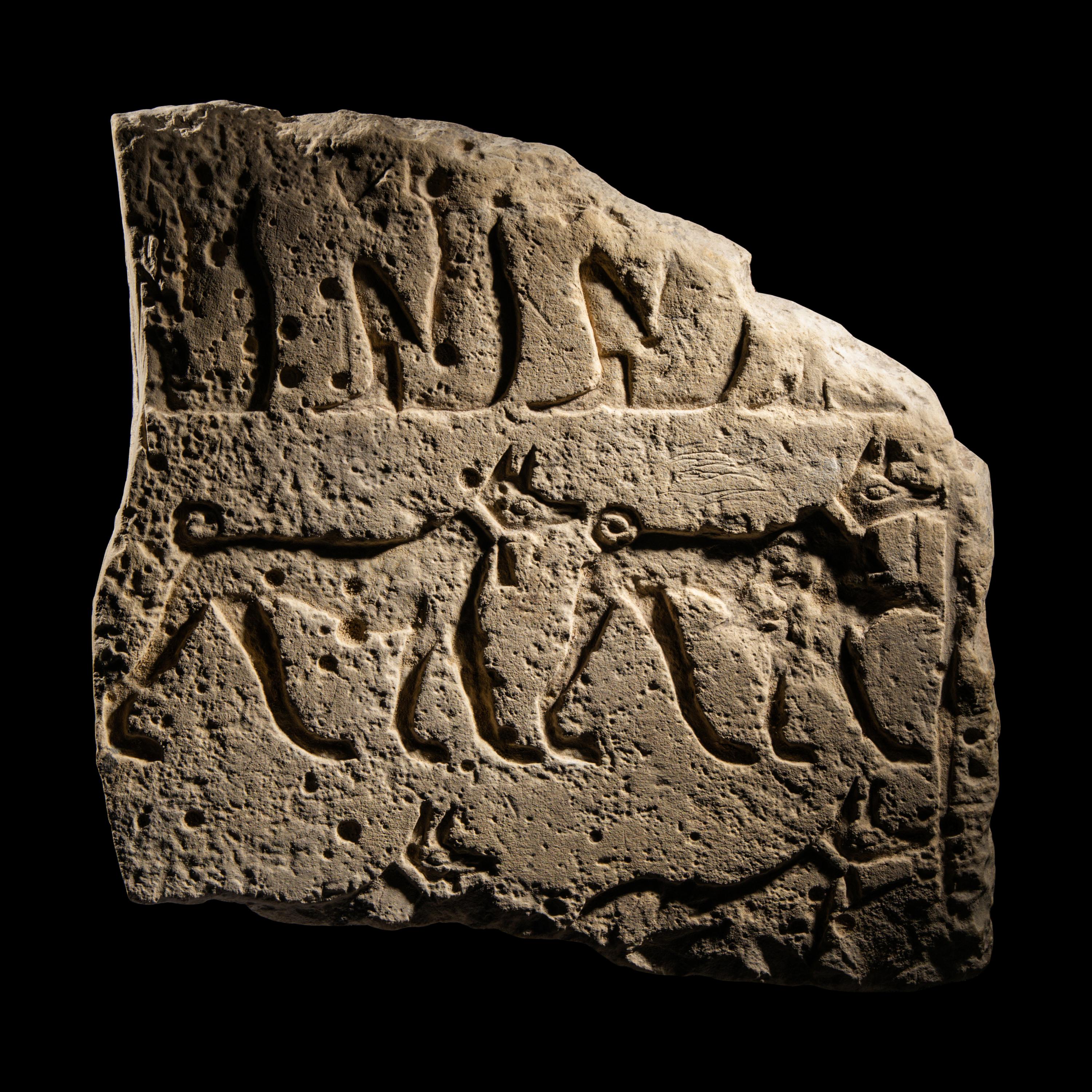 An Egyptian Limestone Relief Fragment