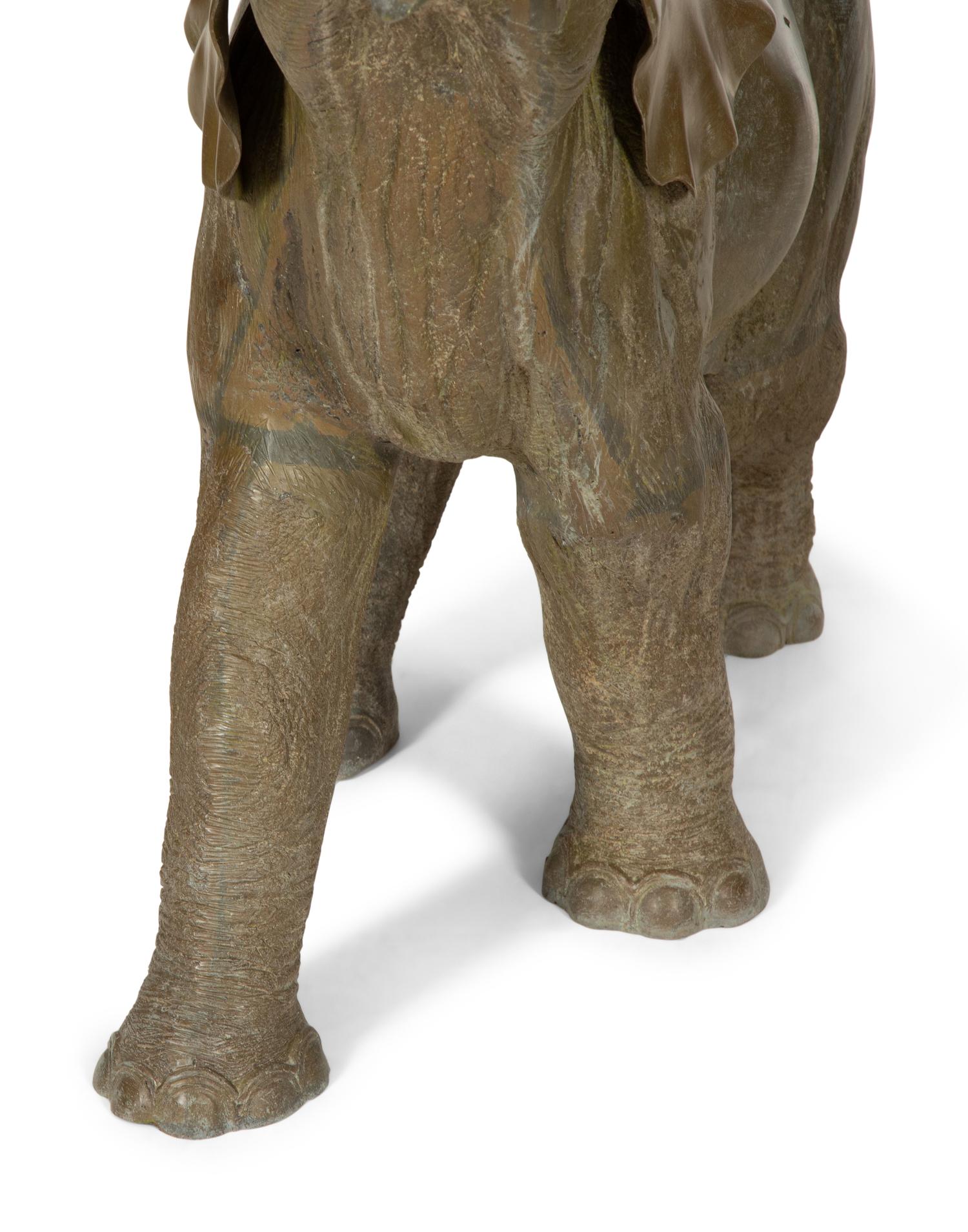 A Pair of Patinated Bronze Elephants
