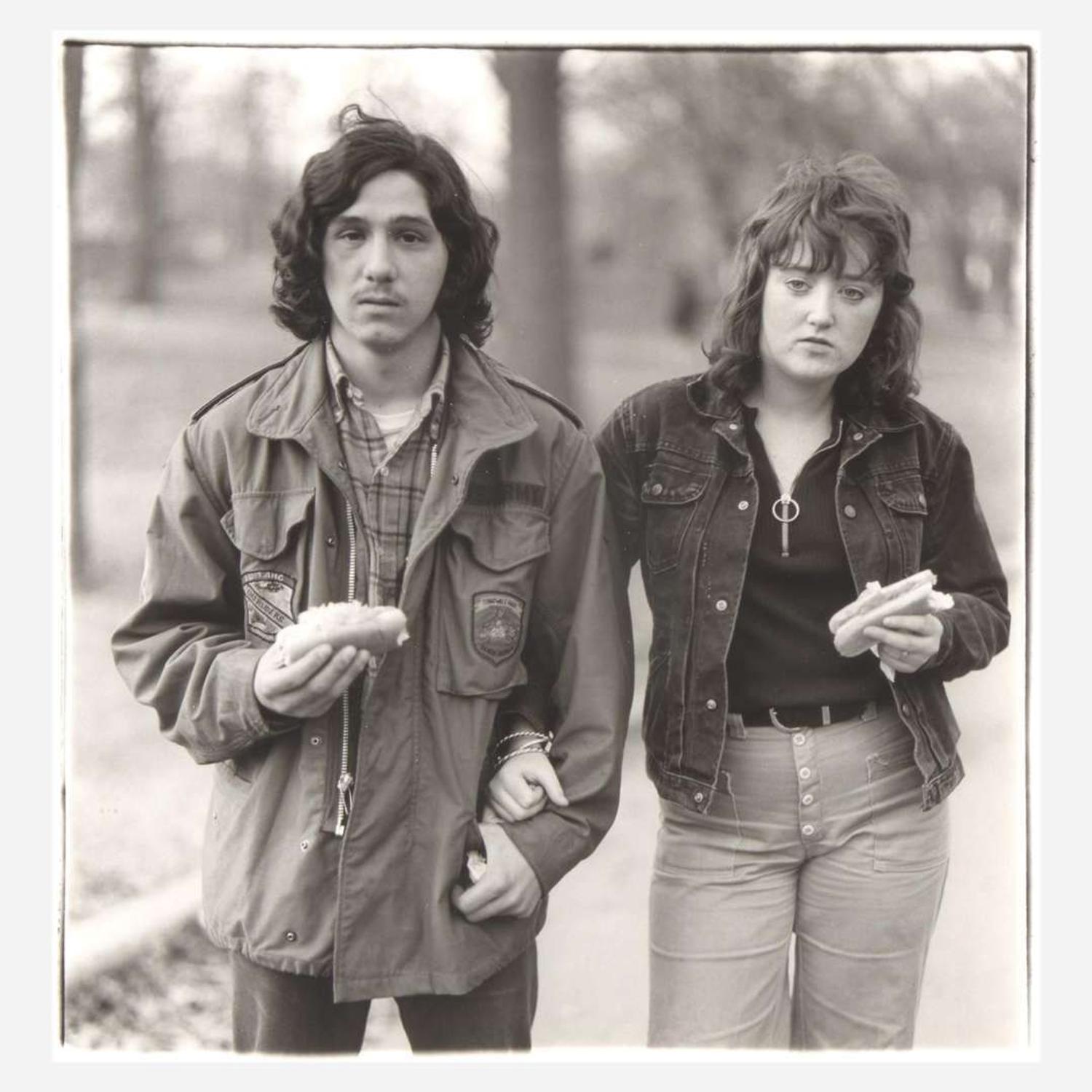 Diane Arbus (American, 1923-1971) A Young Man and His Girlfriend with Hot Dogs in the Park, N.Y.C.