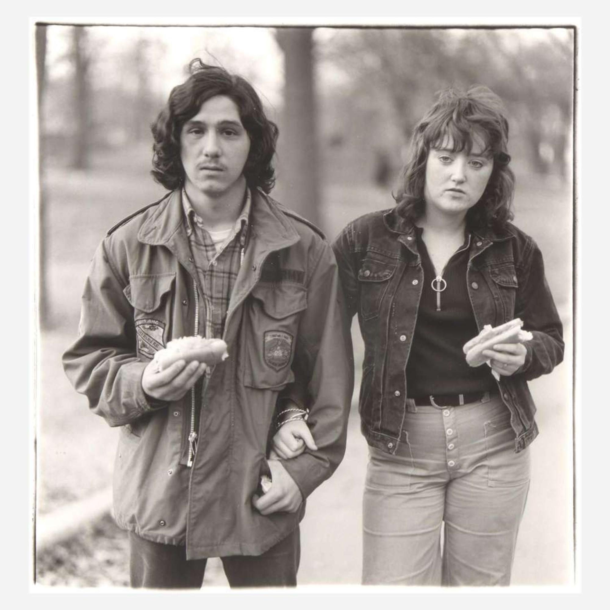 Diane Arbus (American, 1923-1971) A Young Man and His Girlfriend with Hot Dogs in the Park, N.Y.C.