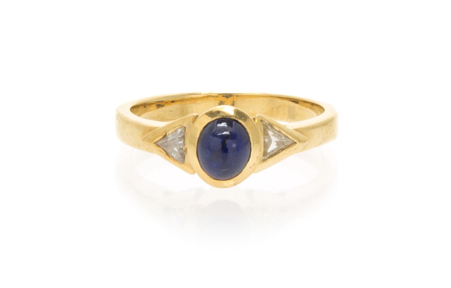 An 18 Karat Yellow Gold Sapphire and Diamond Ring, 2.60 dwts.