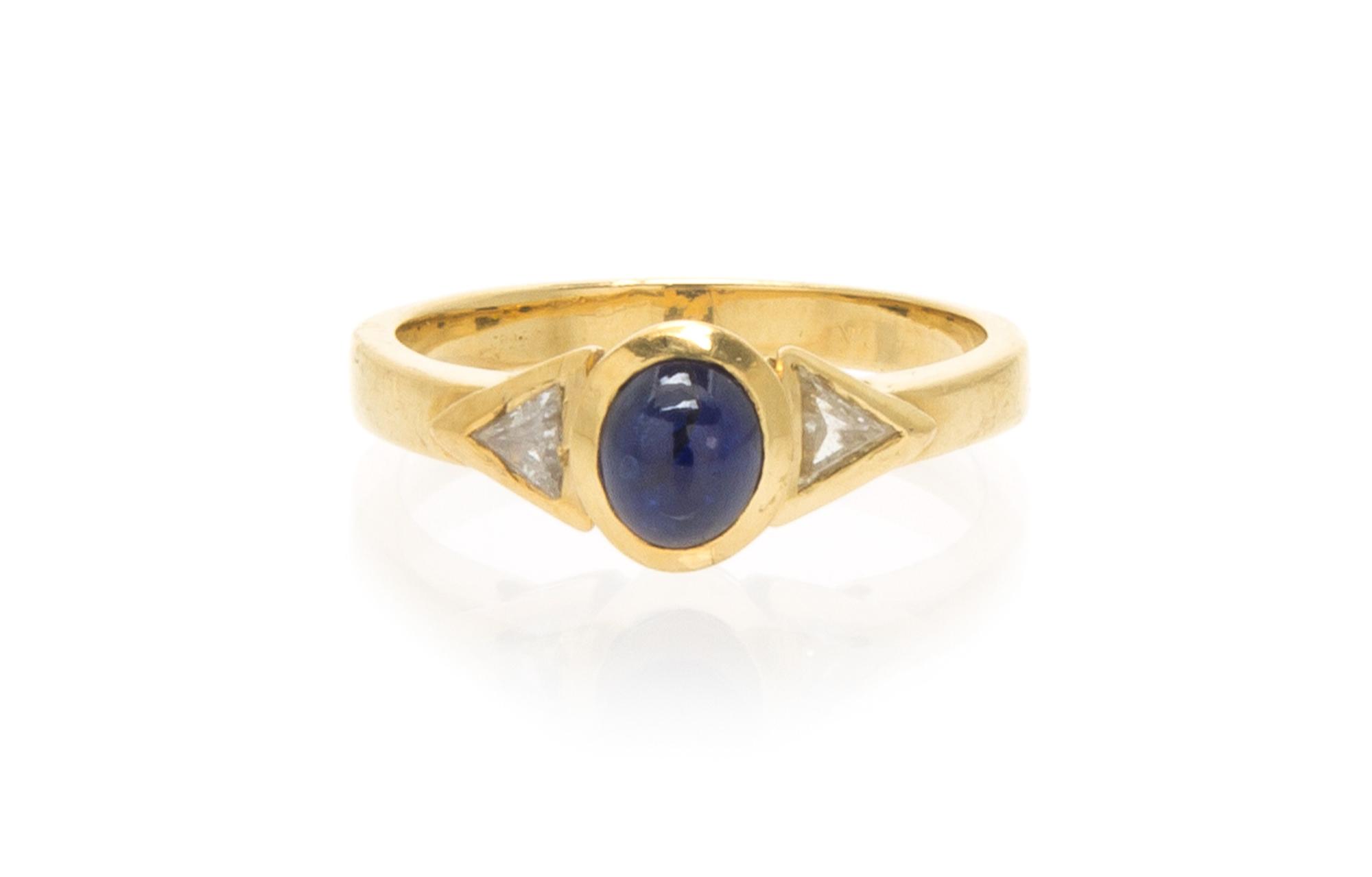An 18 Karat Yellow Gold Sapphire and Diamond Ring, 2.60 dwts.