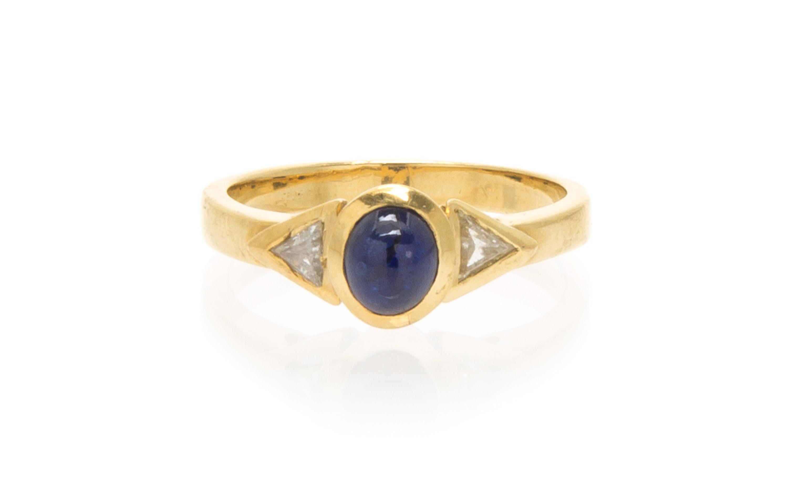 An 18 Karat Yellow Gold Sapphire and Diamond Ring, 2.60 dwts.