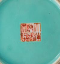 A Pair of Turquoise Ground Famille Rose Vases