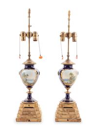 A Pair of Sèvres Style Porcelain Urns Mounted as Lamps