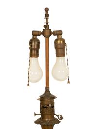 A Pair of Gilt Decorated Black Glass and Gilt Metal Oil Lamps