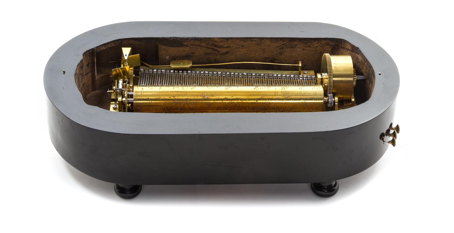 A Swiss Ebonized Cylinder Music Box, Height 4 x width 13 3/8 x depth 6 7/8 inches.