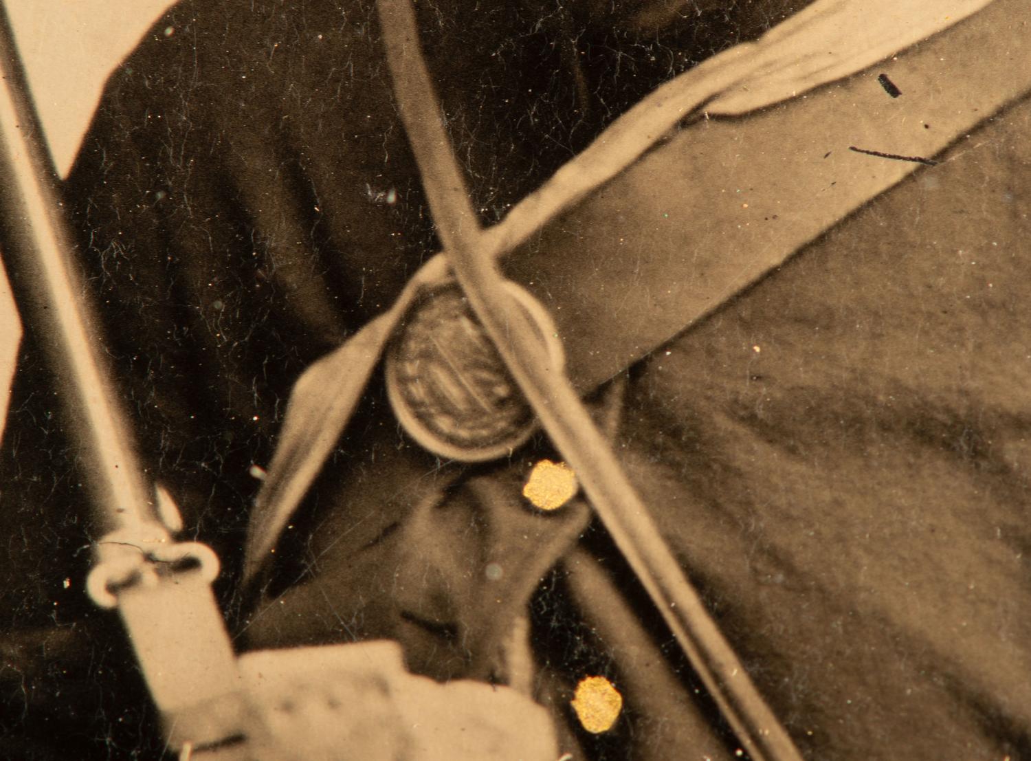 Sixth plate tintype taken in the field featuring Ohio soldiers posed with their rifles, equipment, mess gear, and hardtack.