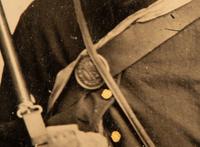 Sixth plate tintype taken in the field featuring Ohio soldiers posed with their rifles, equipment, mess gear, and hardtack.