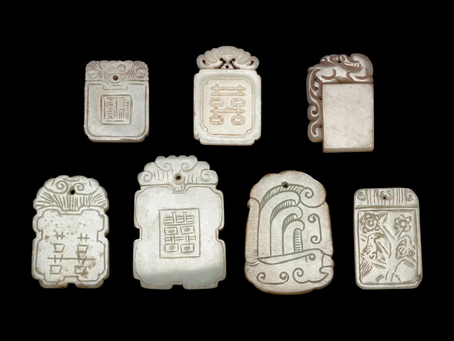 Seven Chinese Pale Celadon Jade Carved Plaques