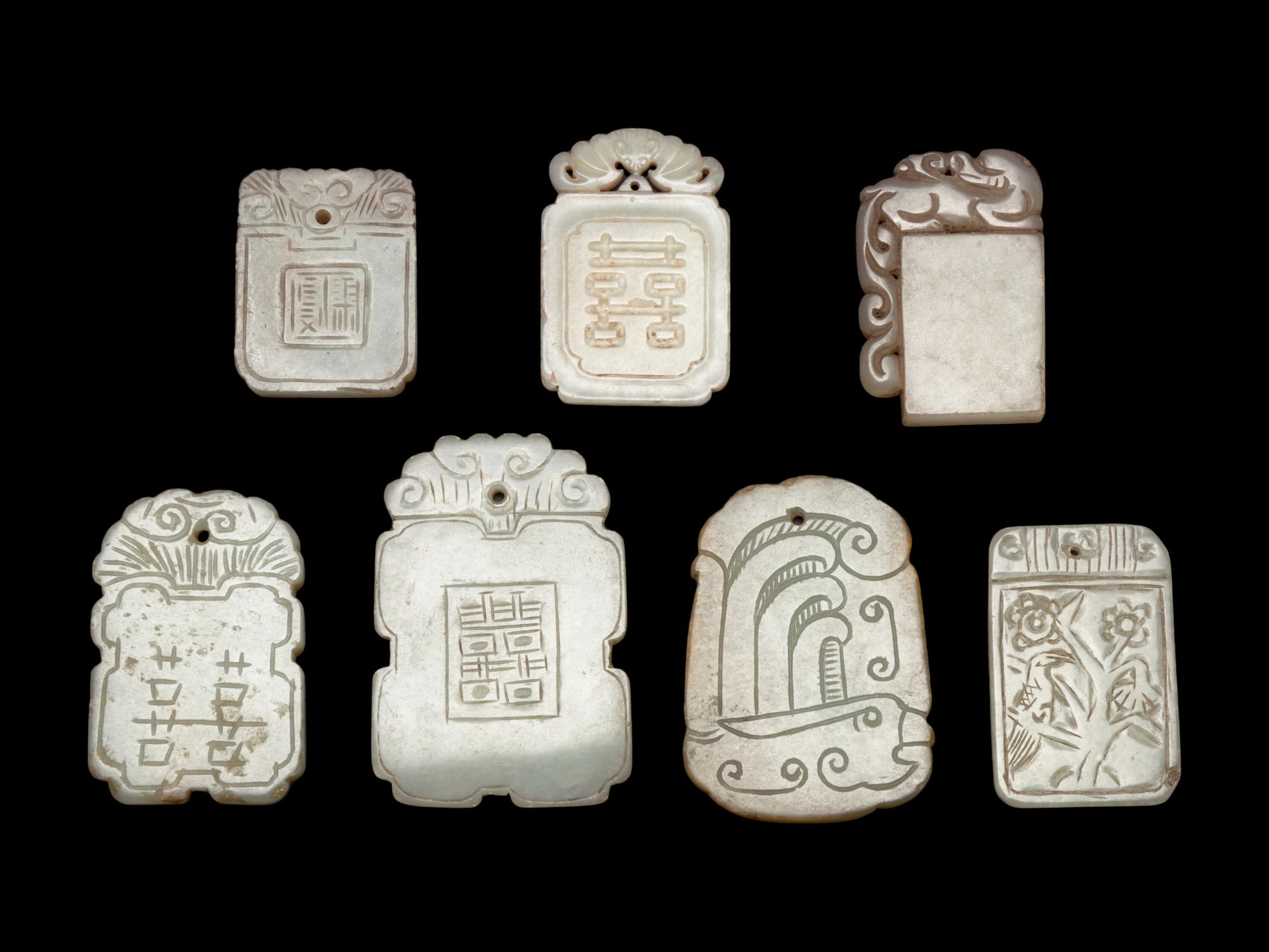 Seven Chinese Pale Celadon Jade Carved Plaques