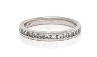 A 14 Karat White Gold and Diamond Ring,