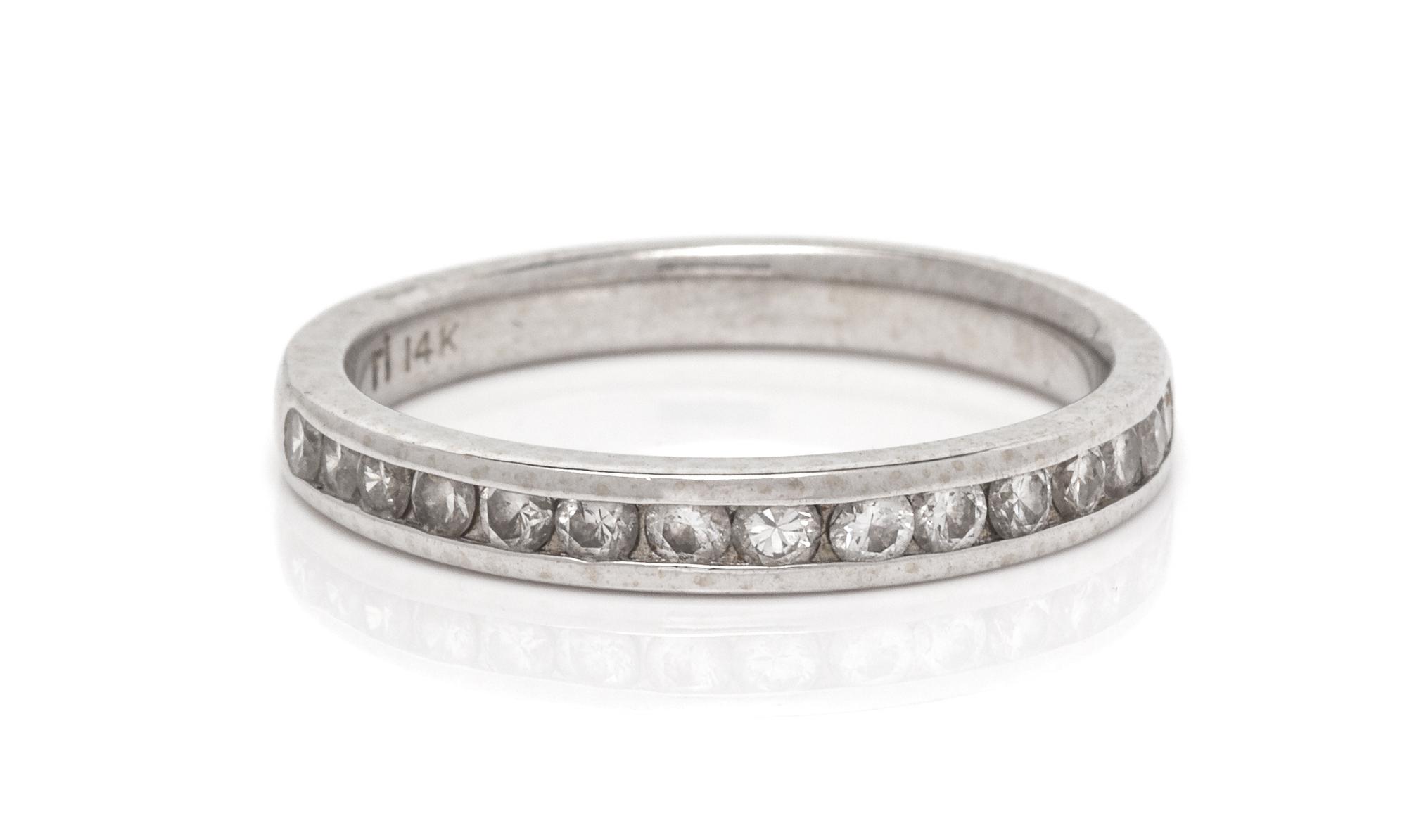 A 14 Karat White Gold and Diamond Ring,