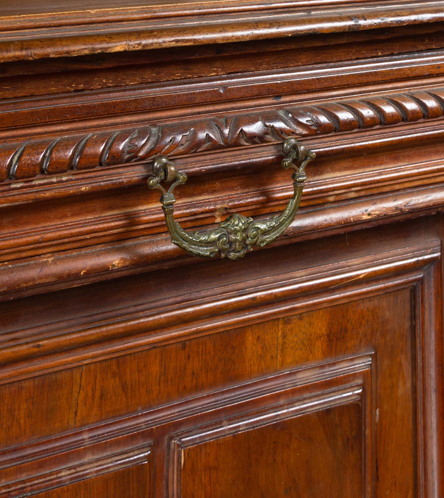 A Renaissance Revival Carved Walnut Serving Cabinet