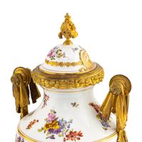 A Pair of Sèvres Style Porcelain and Gilt Bronze Mounted Urns