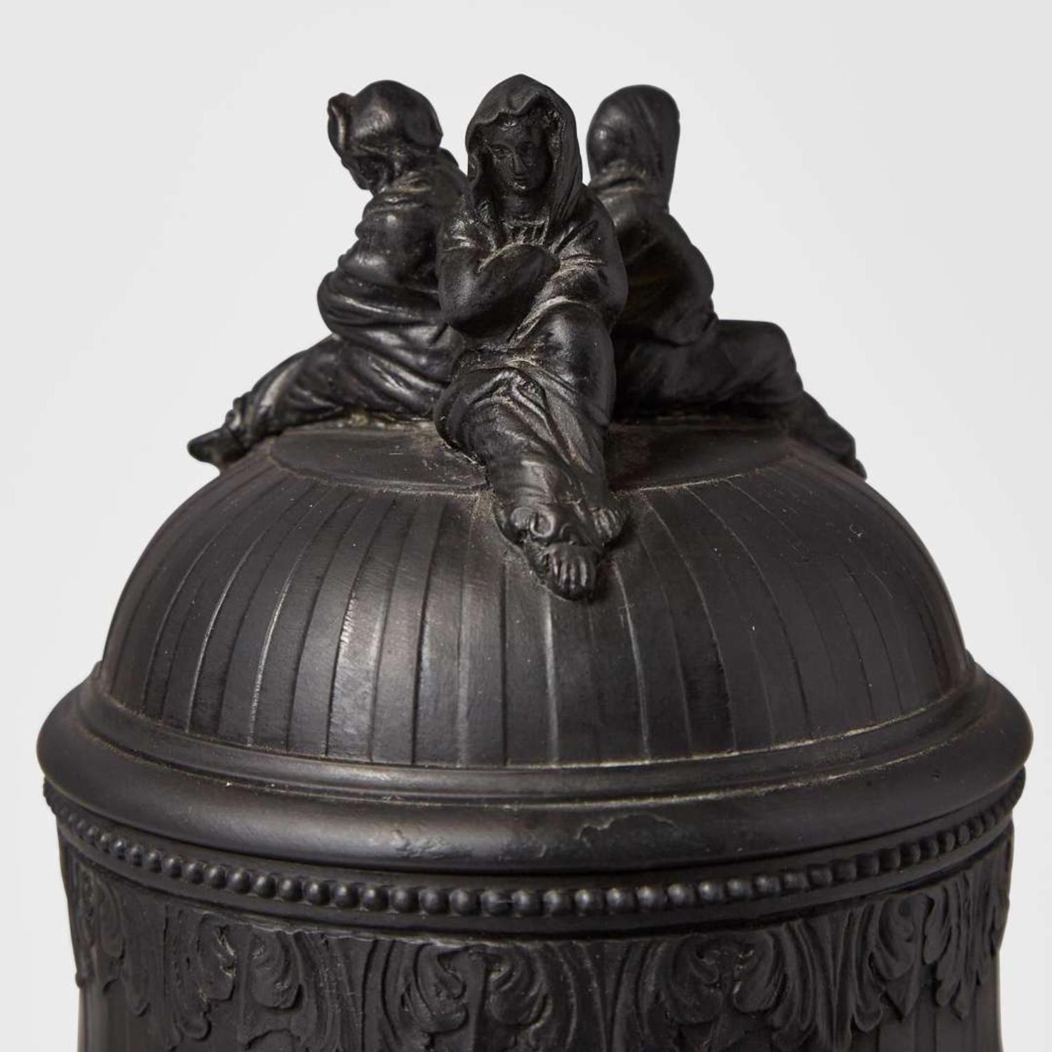 A Wedgwood Black Basalt Tripod Vase and Cover UK, early 19th century