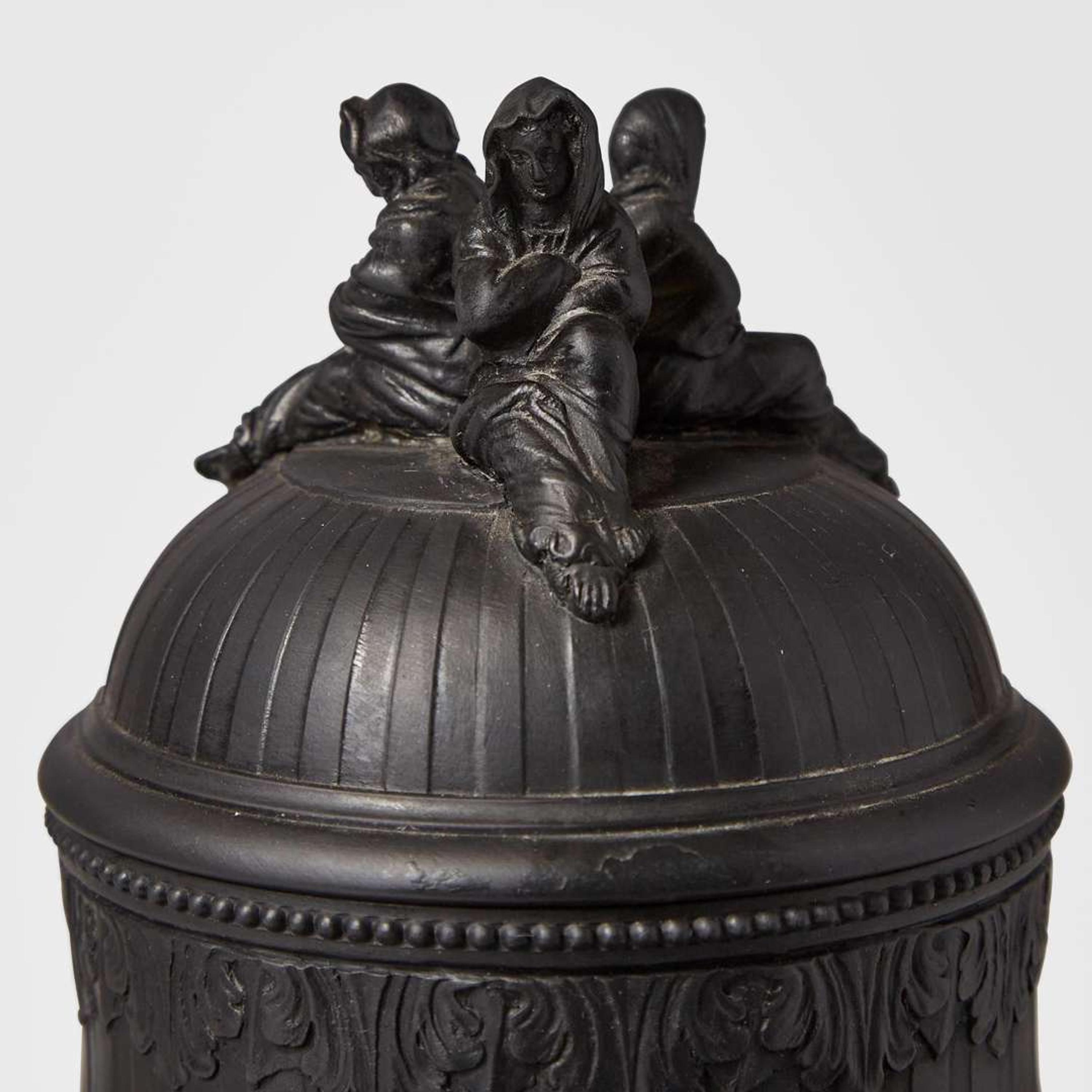 A Wedgwood Black Basalt Tripod Vase and Cover UK, early 19th century