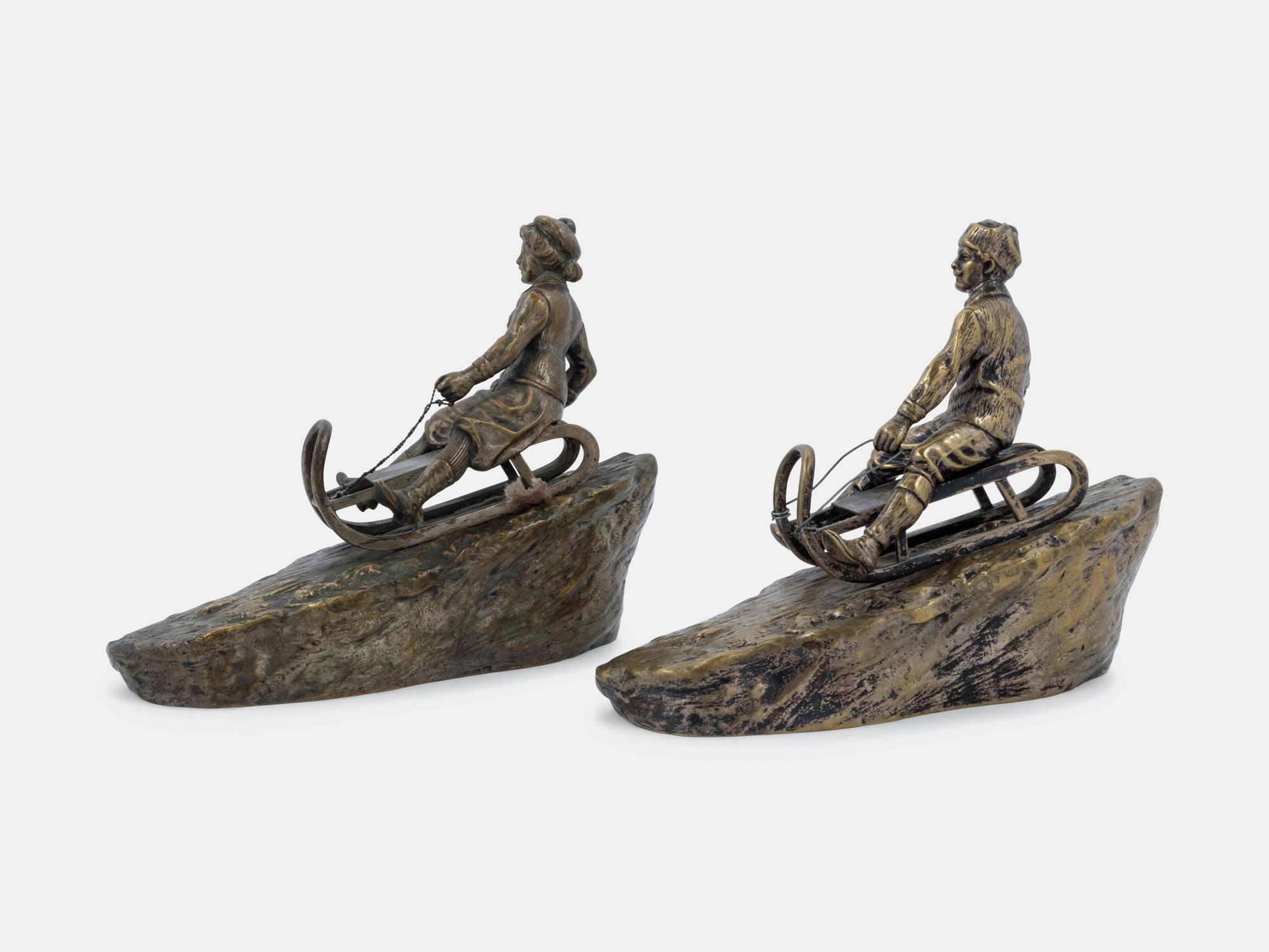 Two Figural Sculptures on Sleds Argentor, Vienna
