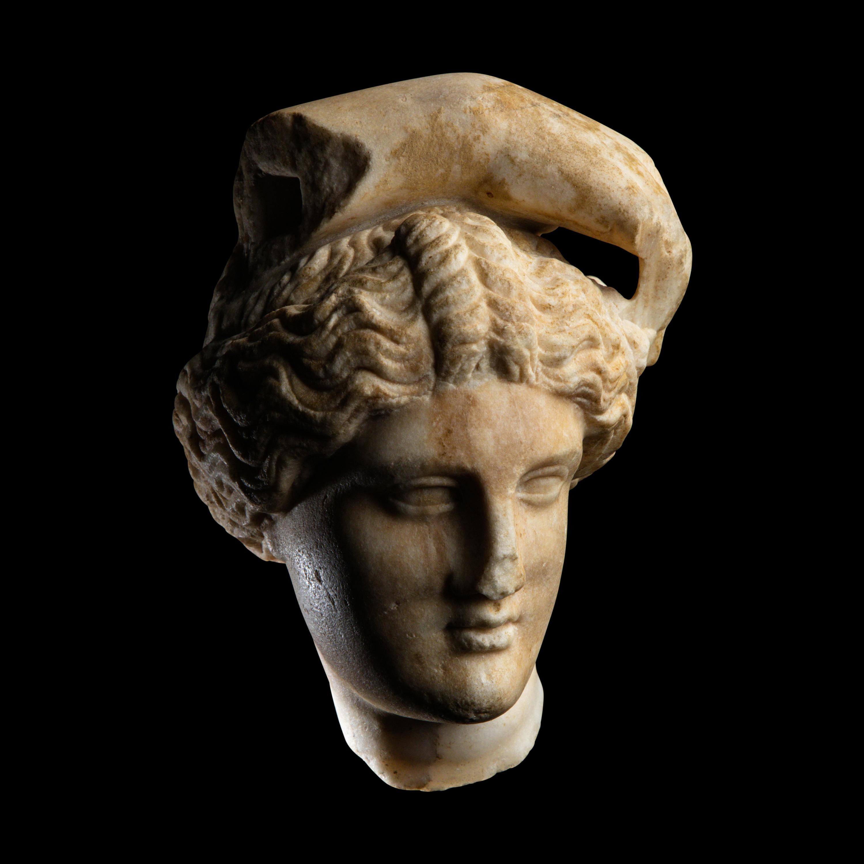 A Roman Marble Head of Apollo Lykeios