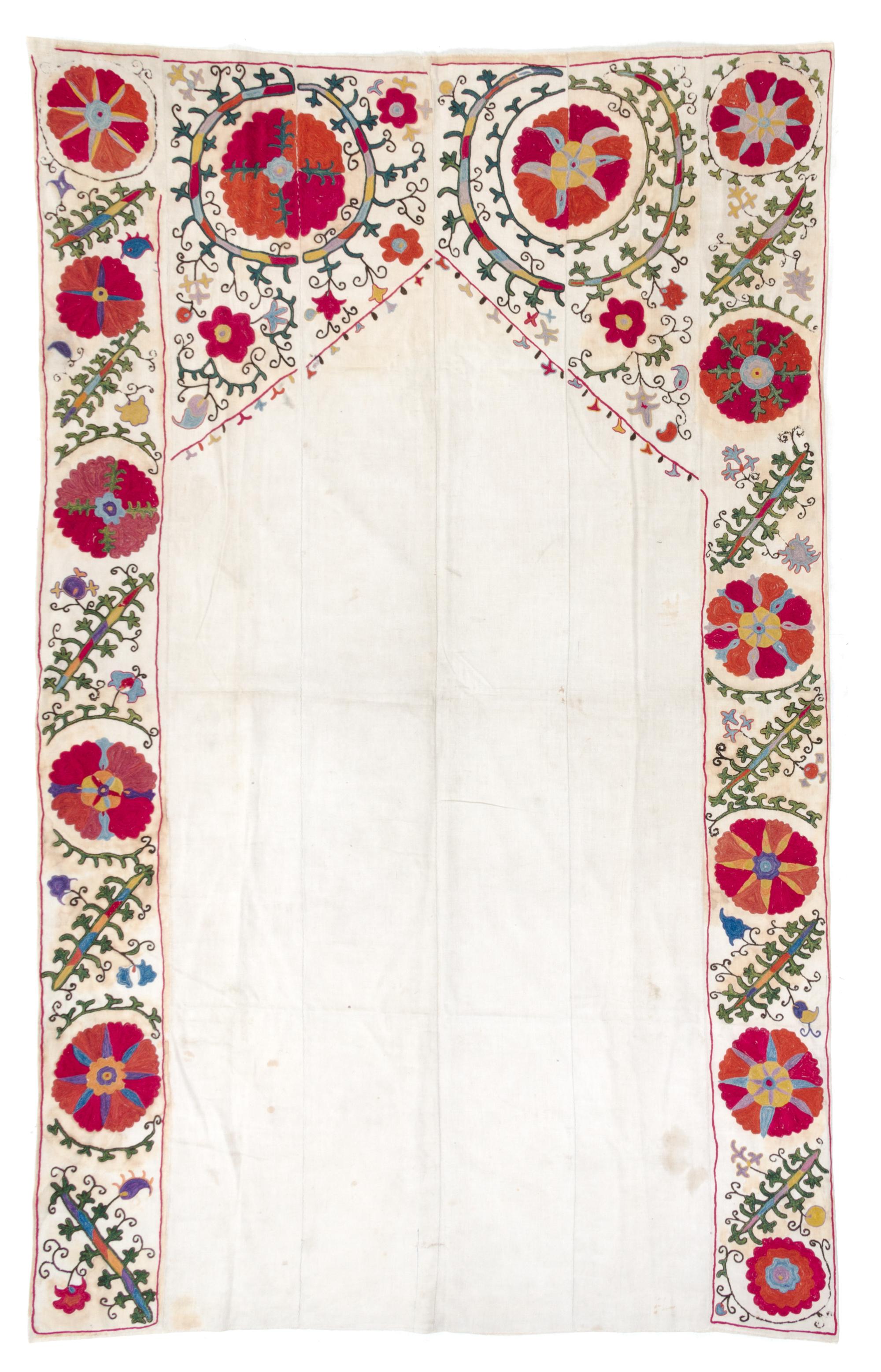 A Bokhara Prayer Arch Suzani Embroidery 7 feet 8 inches x 4 feet 9 1/4 inches. — LATE 19TH/EARLY 20TH CENTURY