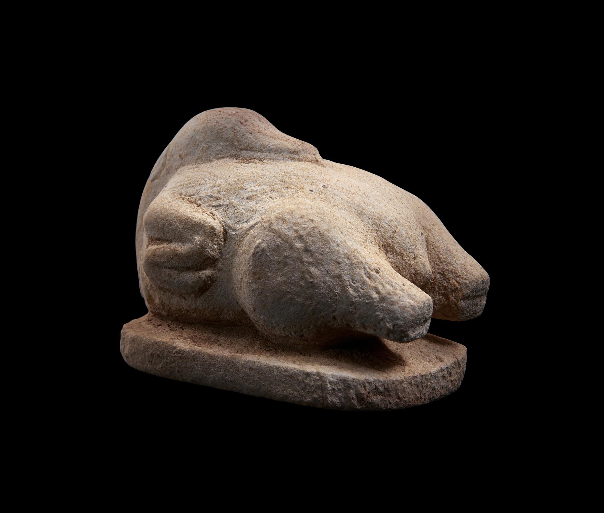An Egyptian Limestone Model of a Trussed Duck