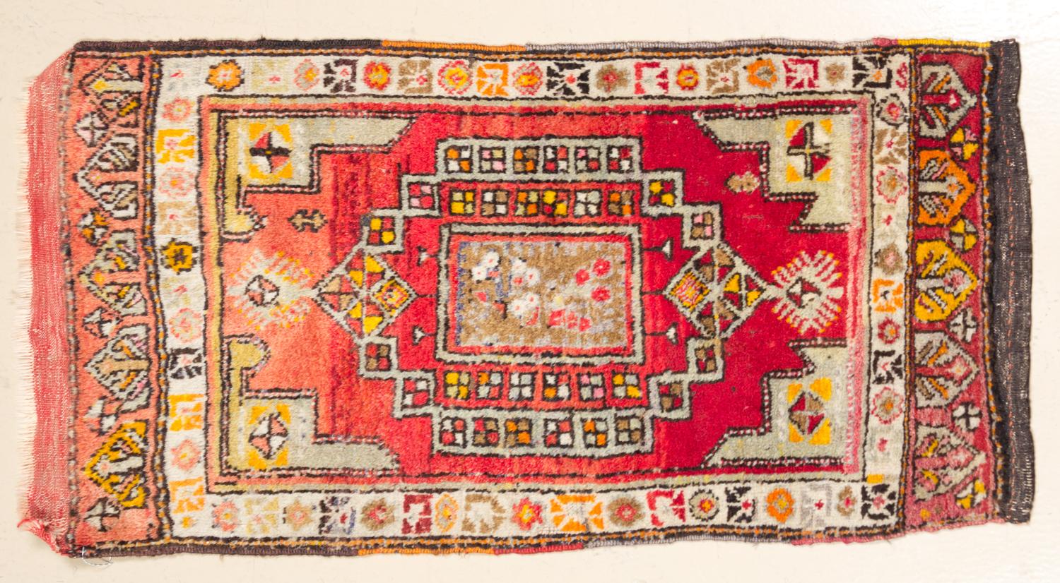 A Northwest Persian Wool Rug 3 feet 2 1/2 inches x 1 foot 10 3/4 inches.