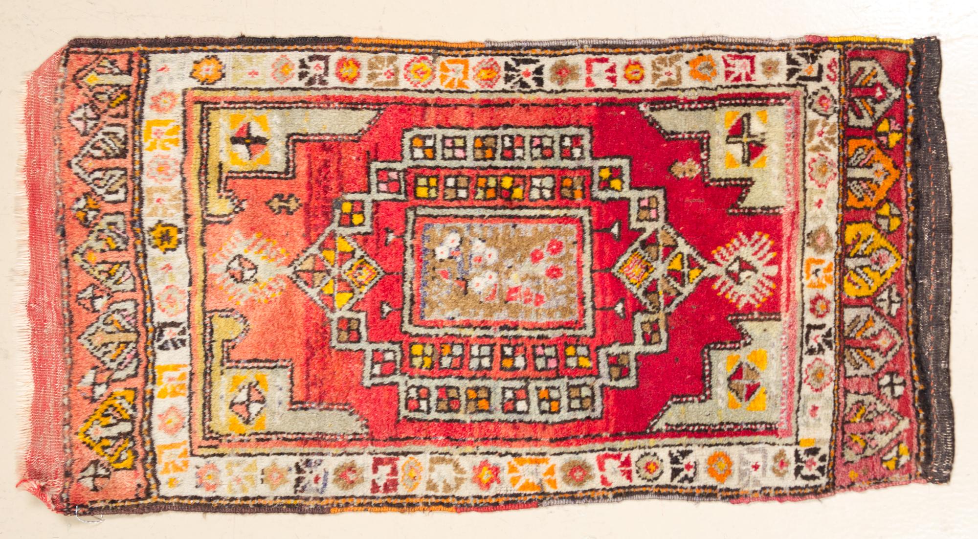 A Northwest Persian Wool Rug 3 feet 2 1/2 inches x 1 foot 10 3/4 inches.