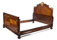 A Louis XV Transitional Style Kingwood, Mahogany, Parquetry and Gilt Bronze Mounted Bed, Height 63 x width 80 x depth 60 inches.