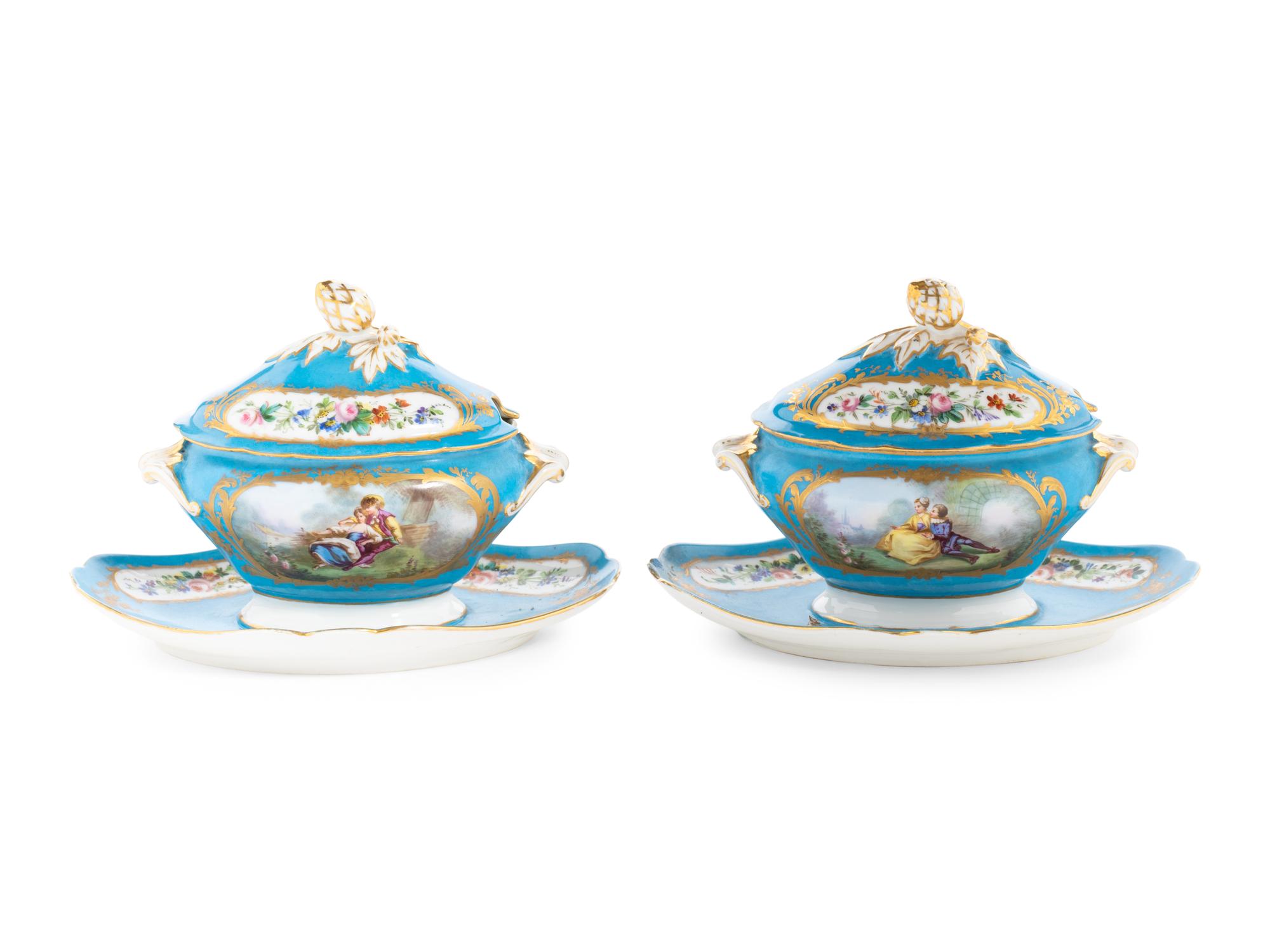 A Pair of Sèvres Style Porcelain Tureens and Underplates