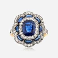 A sapphire, diamond, and platinum topped gold ring