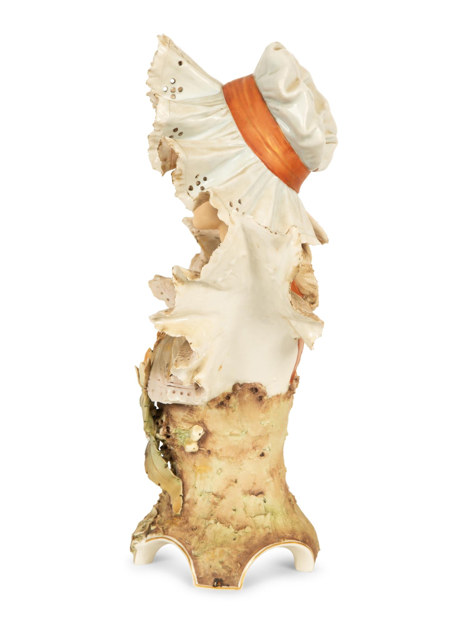 A Royal Dux Porcelain Bust of Woman in Lace Bonnet — Early 20th Century