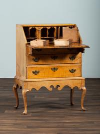 A Diminutive Queen Anne Style Tiger Maple Desk on Stand
