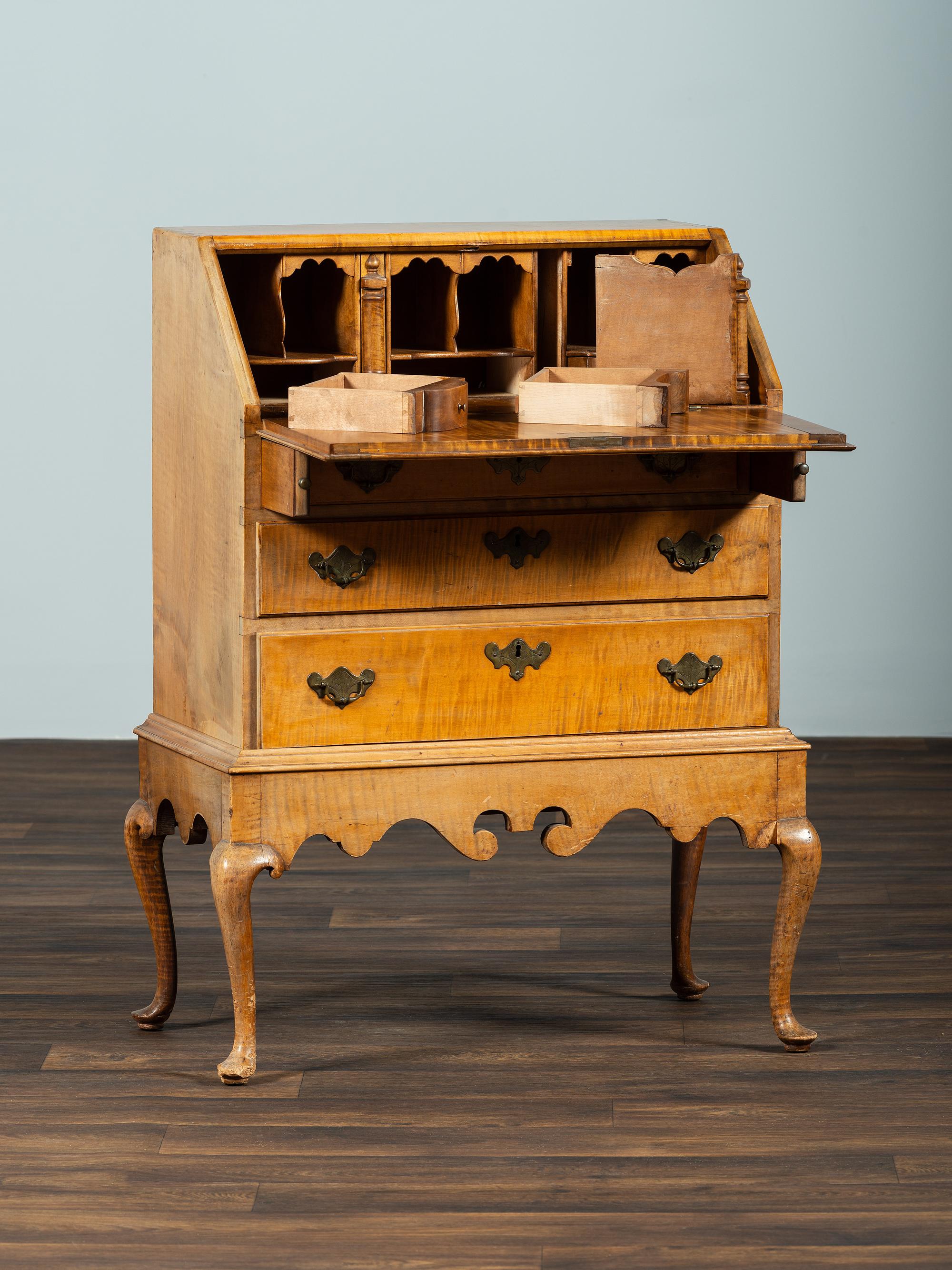 A Diminutive Queen Anne Style Tiger Maple Desk on Stand
