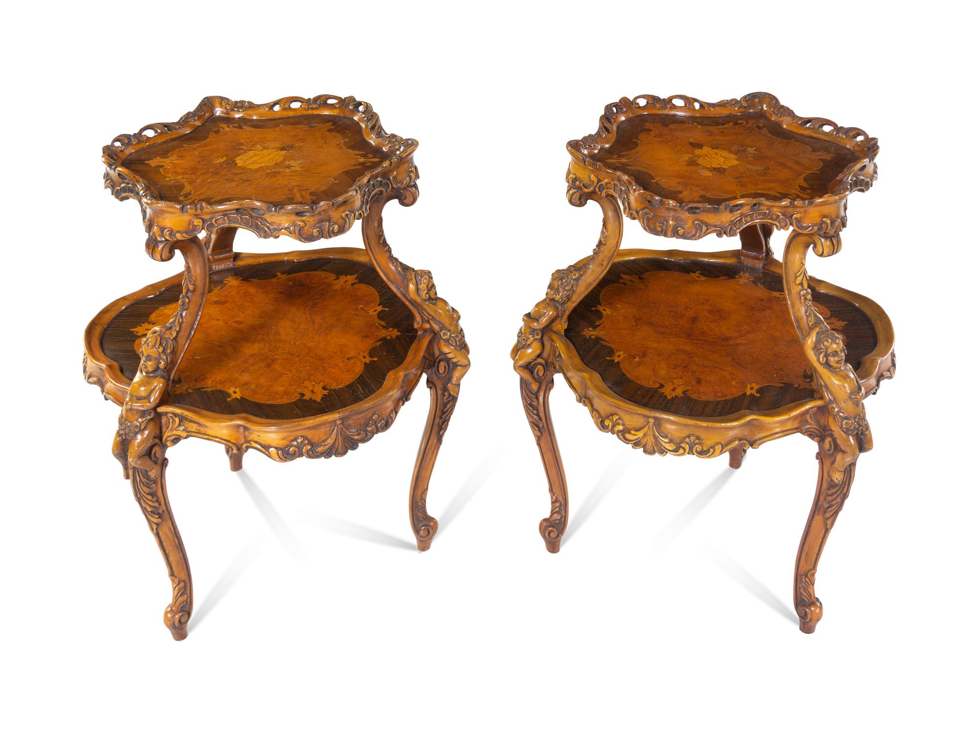 A Pair of Rococo Revival Carved Walnut and Marquetry Two-Tier Tables