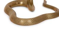 A Pair of Brass Cobra Candlesticks