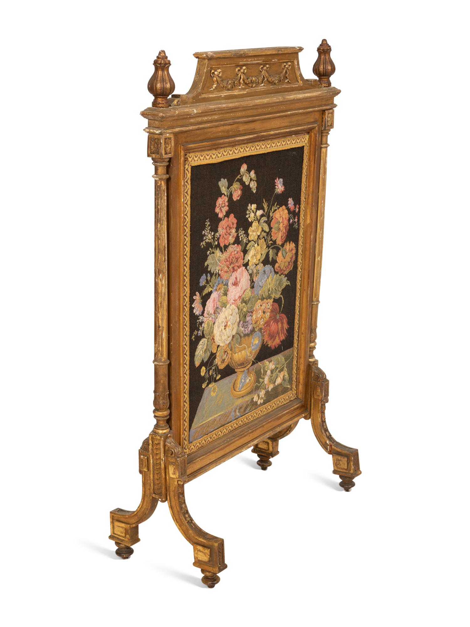 A Louis XVI Style Giltwood Fire Screen with Needlework Panel