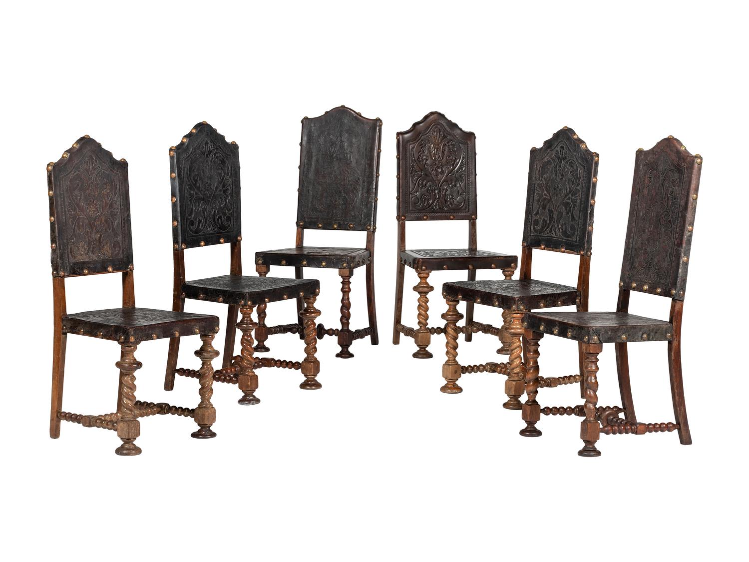 Six Mizner Carved Walnut and Embossed Leather Back Side Chairs