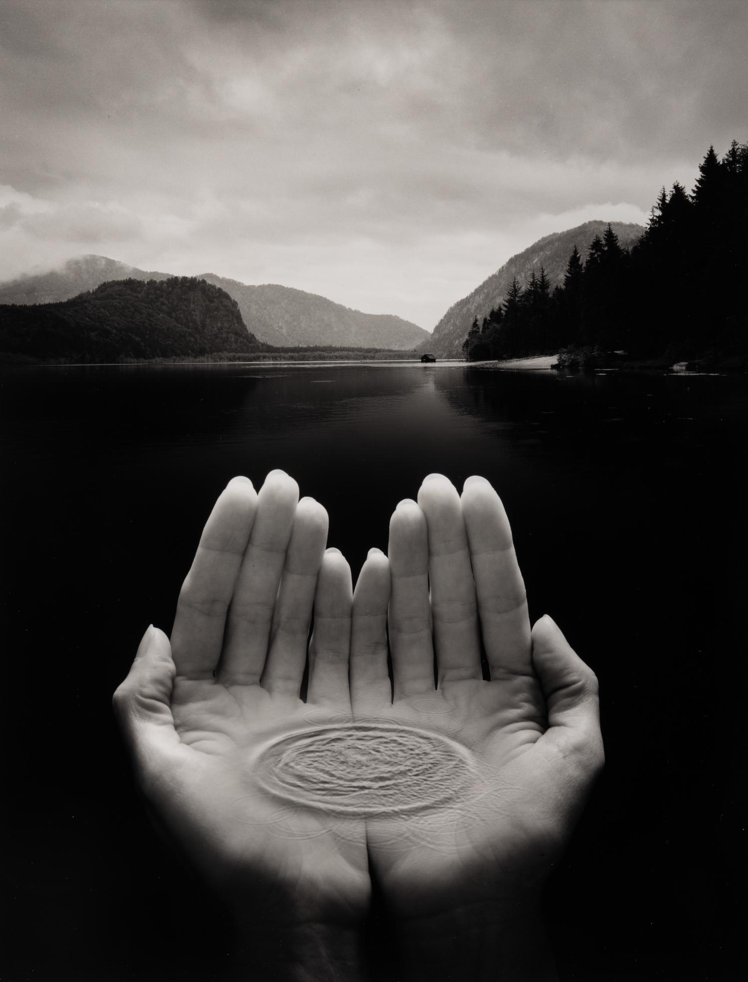 Jerry Uelsmann (1934-2022) Untitled (Hands holding water), 2002